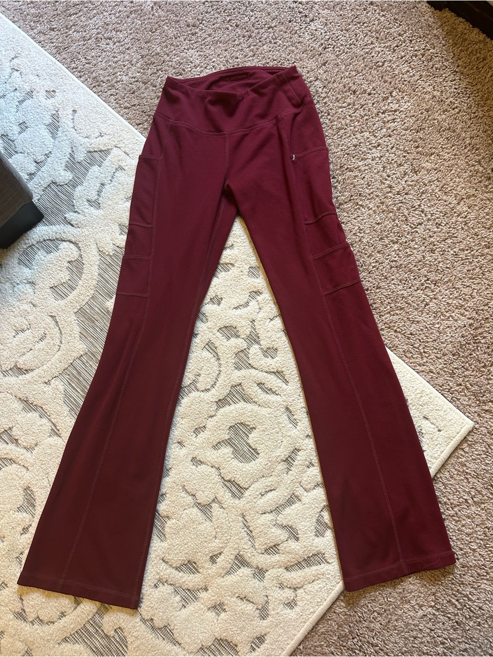 Jaanuu Women's Flare Active Pants in Burgundy